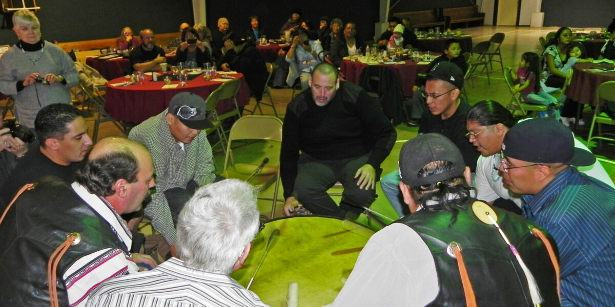 Worship around a drum at the beginning of a Navajo BIC Overcomers rehab meeting at the Navajo Brethren in Christ Mission in New Mexico. Photo submitted. Download full resolution image.