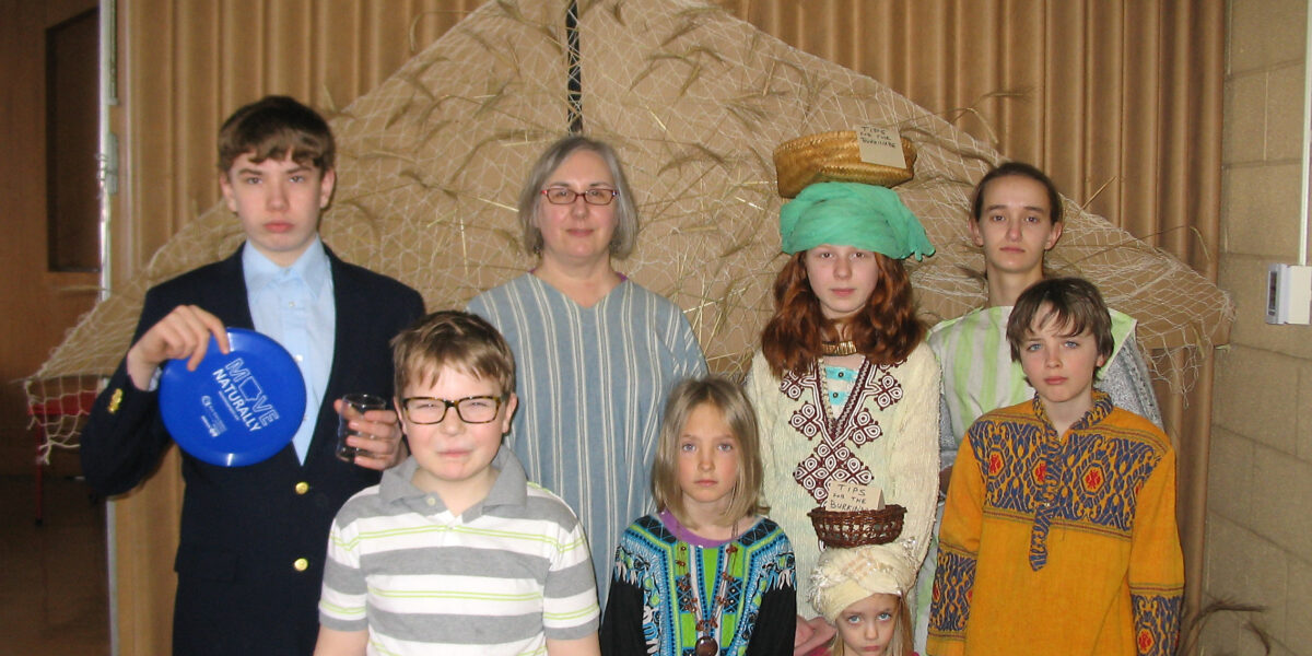 Children at Cedar Falls (Iowa) Mennonite Church pause for a photo during the Burkina Faso mission bank fundraiser. Back row
