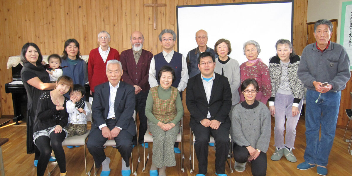 Members of Mennonite churches in Japan shown here are among those who are re-emphasizing peace as the nation discusses restoring its military’s ability to go to war outside of Japan’s borders. Back row from left to right: Fumiko Kawaguchi holding baby Oki Kawaguchi