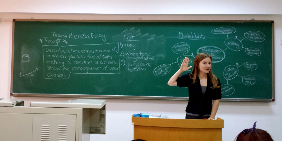Kelly McPhail teaching English to adults in China. Photo courtesy of Brian and Kelly McPhail. Download full resolution image.