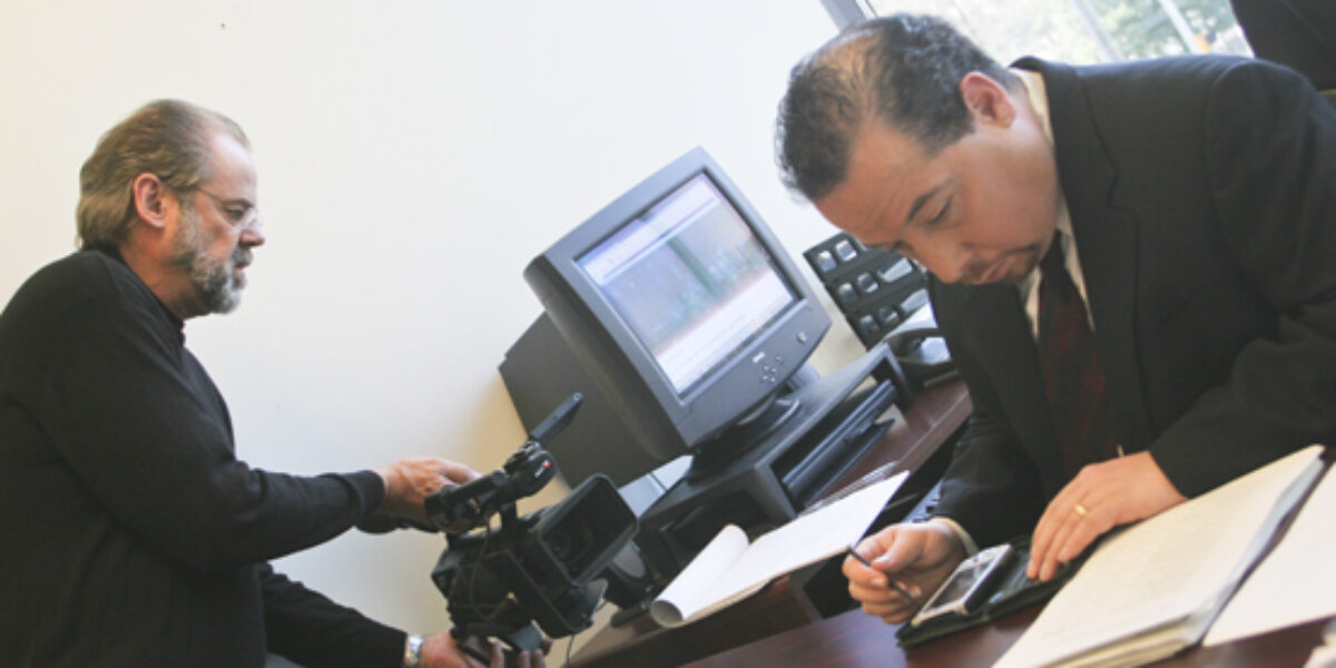 Burton Buller prepares to videotape Ray sharing his story of mental illness and homelessness for the Shadow Voices: Finding Hope in Mental Illness documentary.Download high-resolution photo