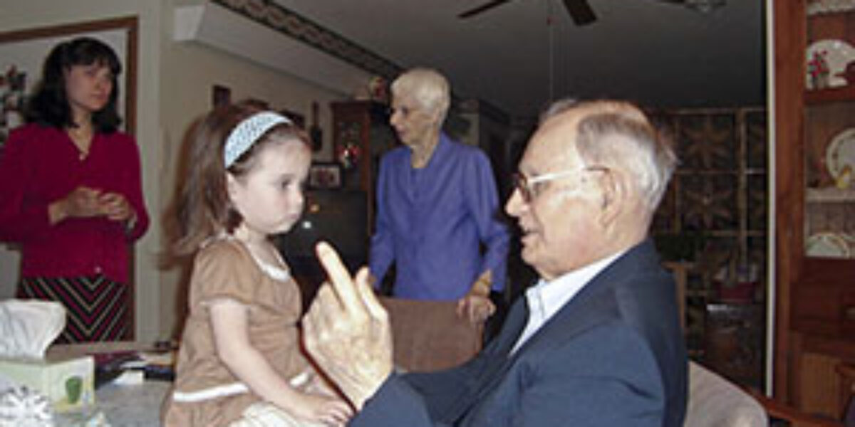 Eugene Blosser (1917-2008) with granddaughter Hannah.