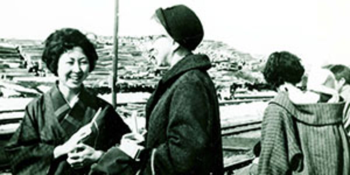 Rhoda Ressler (right) witnesses at a train station