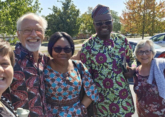 Cindy Voth, Rod Hollinger-Janzen, Jocelyne Ahoga, Germain Dossou and Rachel Stoltzfus enjoy time together during the Benin Bible Institute (BBI) representatives’ visit to Waterford Mennonite Church (WMC) in 2024. Voth is lead pastor at WMC. Ahoga and Dossou are BBI representatives. Hollinger-Janzen and Stoltzfus are on WMC’s partnership planning committee. Photo provided.