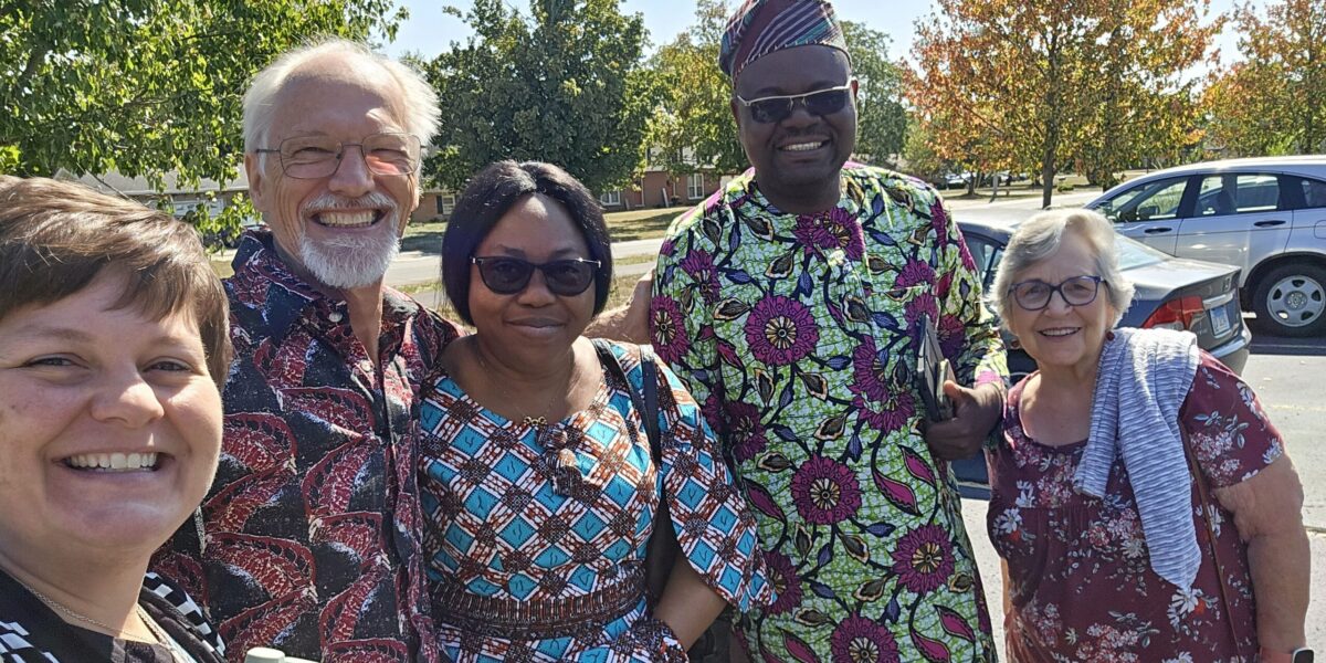 Cindy Voth, Rod Hollinger-Janzen, Jocelyne Ahoga, Germain Dossou and Rachel Stoltzfus enjoy time together during the Benin Bible Institute (BBI) representatives’ visit to Waterford Mennonite Church (WMC) in 2024. Voth is lead pastor at WMC. Ahoga and Dossou are BBI representatives. Hollinger-Janzen and Stoltzfus are on WMC’s partnership planning committee. Photo provided.