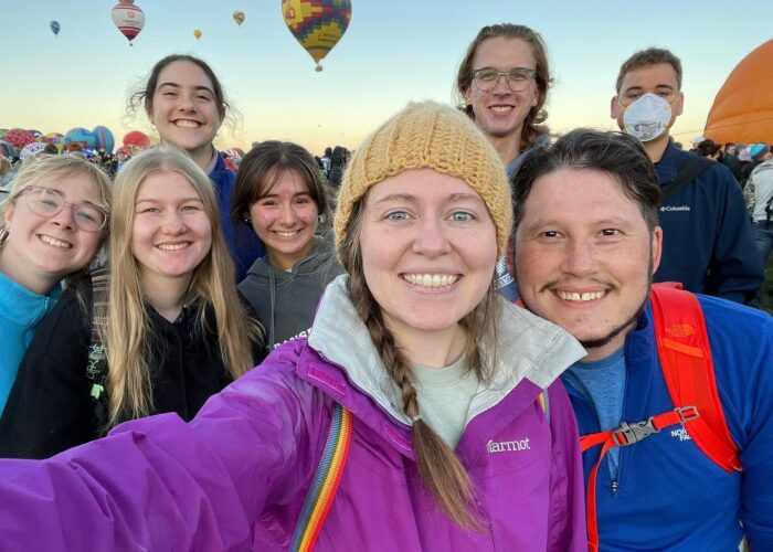 Back row: Malia Bauman, Micah Wenger, and August Barrett-Fox middle row: Neeltje Sandersfeld, Ronja Loritz, and Rylee Weishaupt front row: Shelby and Travis Clarke Colorado Springs and Albuquerque Service Adventure @balloonfiesta 2022