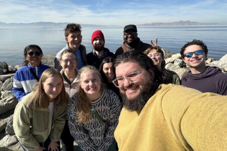 2024-25 MVS participants with Alex Mace (MVS director) and Justin Odom (Development Representative) at the annual MVS orientation retreat. Left to right: Zing Bawi Ken, Hannah Lehman, Ana Esperanza Neufeld Weaver, Conrad Liechty, Schyler Entz, Patrick Webb, Emily Keefer, Alex Mace, Justin Odom, Sav Roth Walter, and Josh Kennell. Lehman, Weaver, and Keefer are extending their terms another year. Photo by Alex Mace.