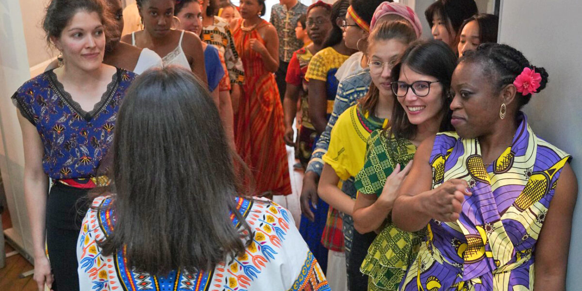 ​Psalt choir members prepare to go on stage for their Aug. 24