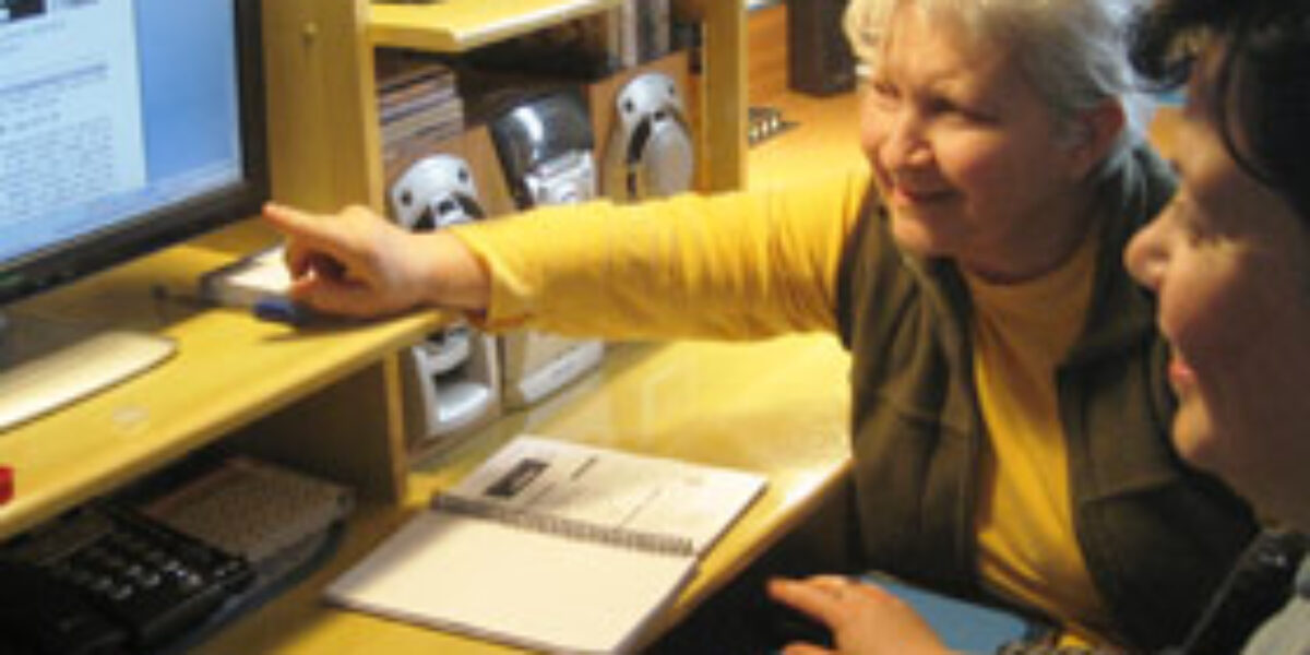 Marlene Dorigoni (near) and Wanda Sieber work together to design Bible study materials that address questions and concerns speci