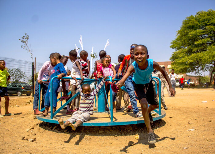 Children play at the new Bontleng Futsal Park in Botswana. Photo by Gonna Lewis. Reprinted courtesy of Imprint Botswana