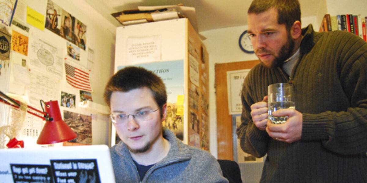 Daniel Hershberger (right) and Marius van Hoogstraten at work in the Military Counseling Network office. (Photo provided)Download high-resolution image