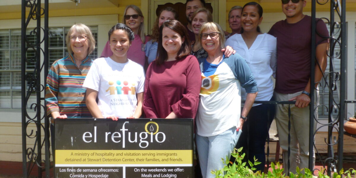 ​A group of Saturday volunteers stop by the El Refugio hospitality house before going over to Steward Detention Center