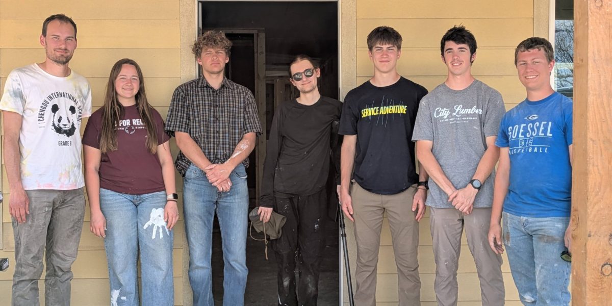 The Service Adventure teams in front of the house they helped construct with Mennonite Disaster Service. Left to right: Christian Stoltzfus (Colorado Springs unit co-leader), Adriana Duerksen, Michael Bergen, Mir Knego (Anchorage unit leader), Ruben Veigel, Ian Unzicker, Sam Abrahams. Photo provided.