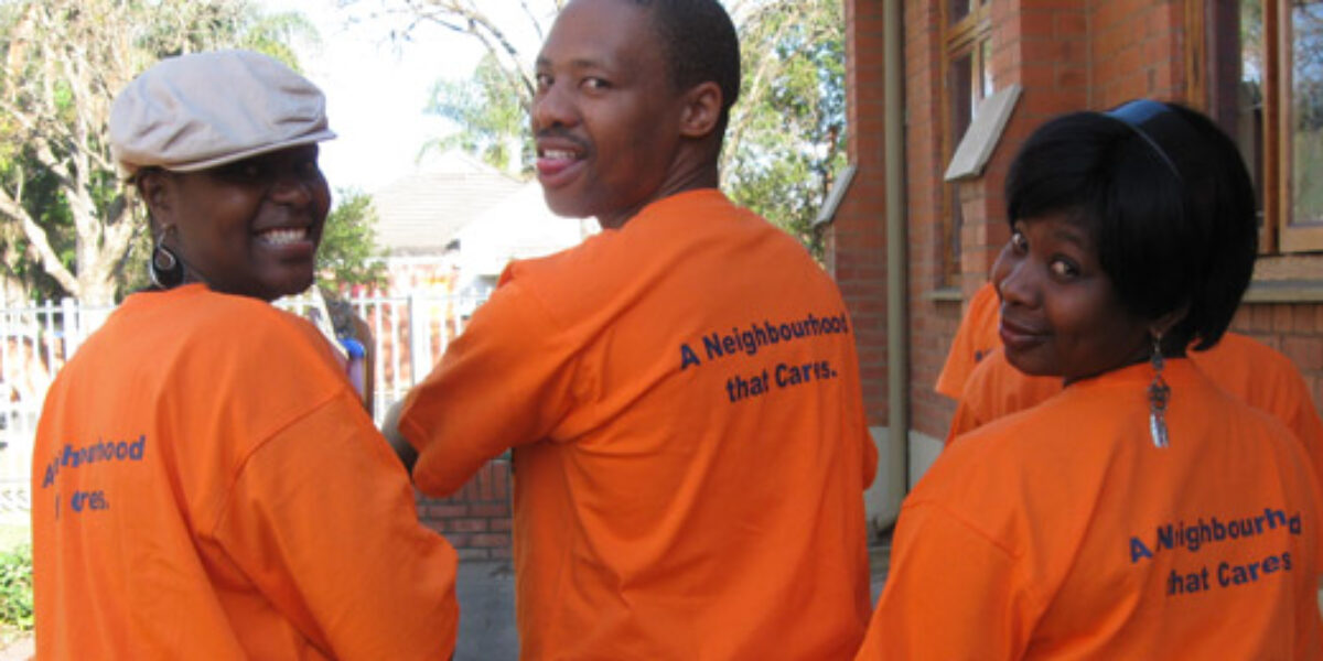 Breakthru church members show off shorts they wore during a listening intiative