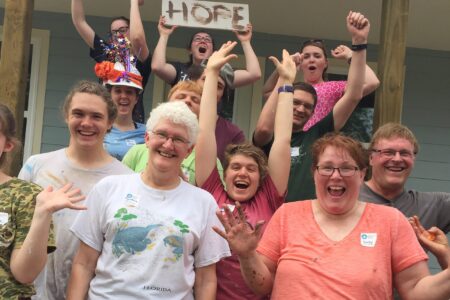 Service Adventure participants and leaders volunteered together working on home renovation in South Texas. From the left side of the front row to back row: Cynthia Neufeld Smith