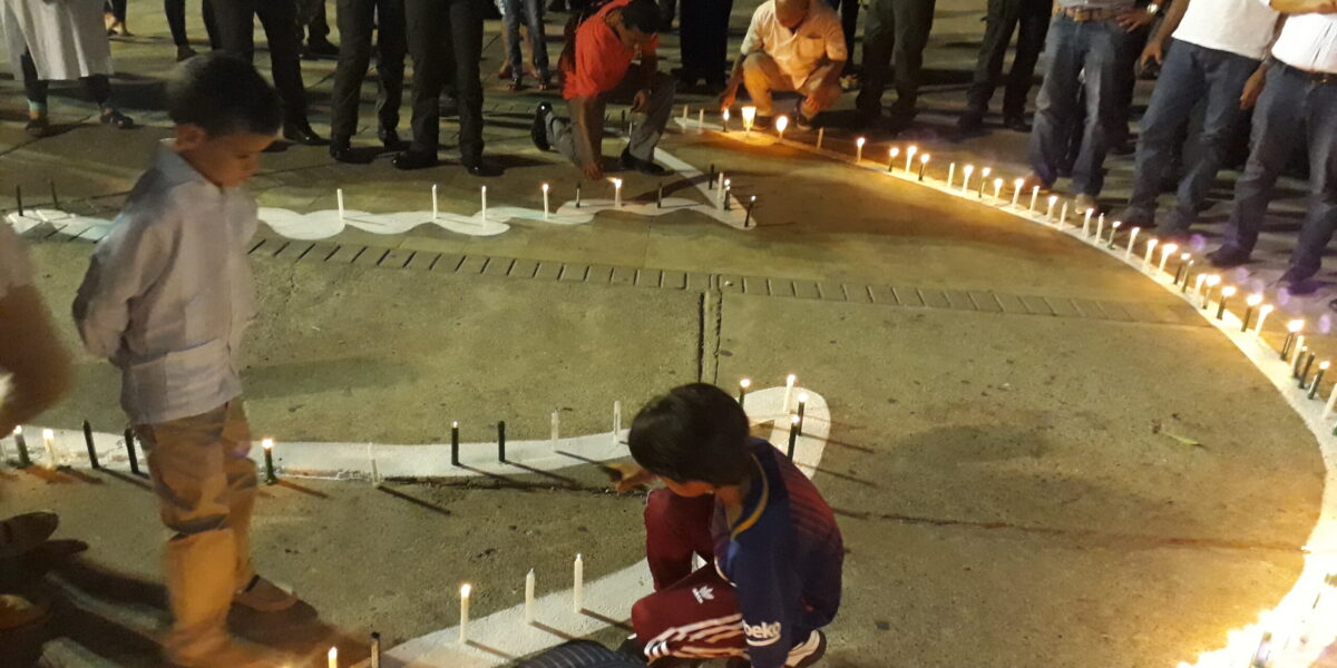 ​Little boys participate in a peace vigil held in Riohacha